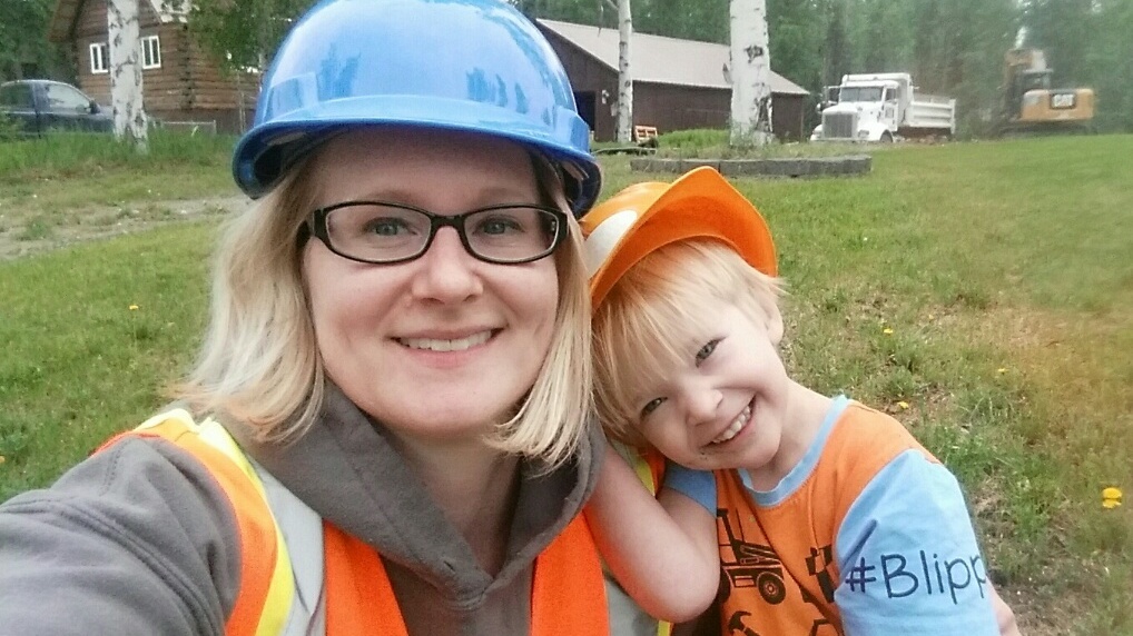 Mamie Brown, a lawyer in Fairbanks, Alaska, takes a selfie with her son, Edward. She has found herself squeezed between work and caring for her two kids during the coronavirus pandemic. Mamie Brown and her son Edward