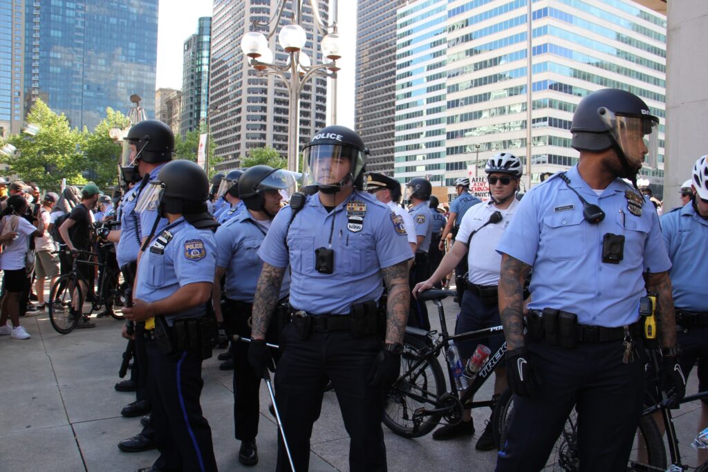 2020 05 30-e lee-philadelphia-protest and rioting Police, some wearing body cameras, guard the Municipal Services Building during protests on May 30, 2020. (Emma Lee/WHYY)