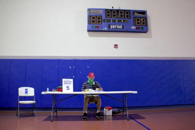 Poll worker Scott Zielinski