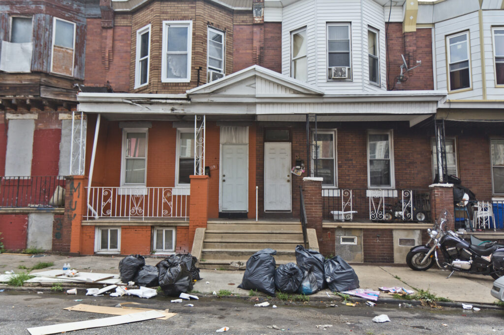 2020 7 16 k paynter trash collection delay-3 Bagged up trash sit outside Philly homes
