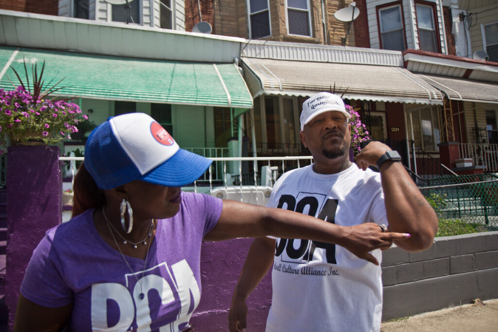 2020 7 2 k paynter blackwell 52nd and sansom-6 Saj Blackwell points to Thomas Blackwell’s scar, where he was nicked with a rubber bullet the night of protests and looting on 52nd Street in Philadelphia. (Kimberly Paynter/WHYY)