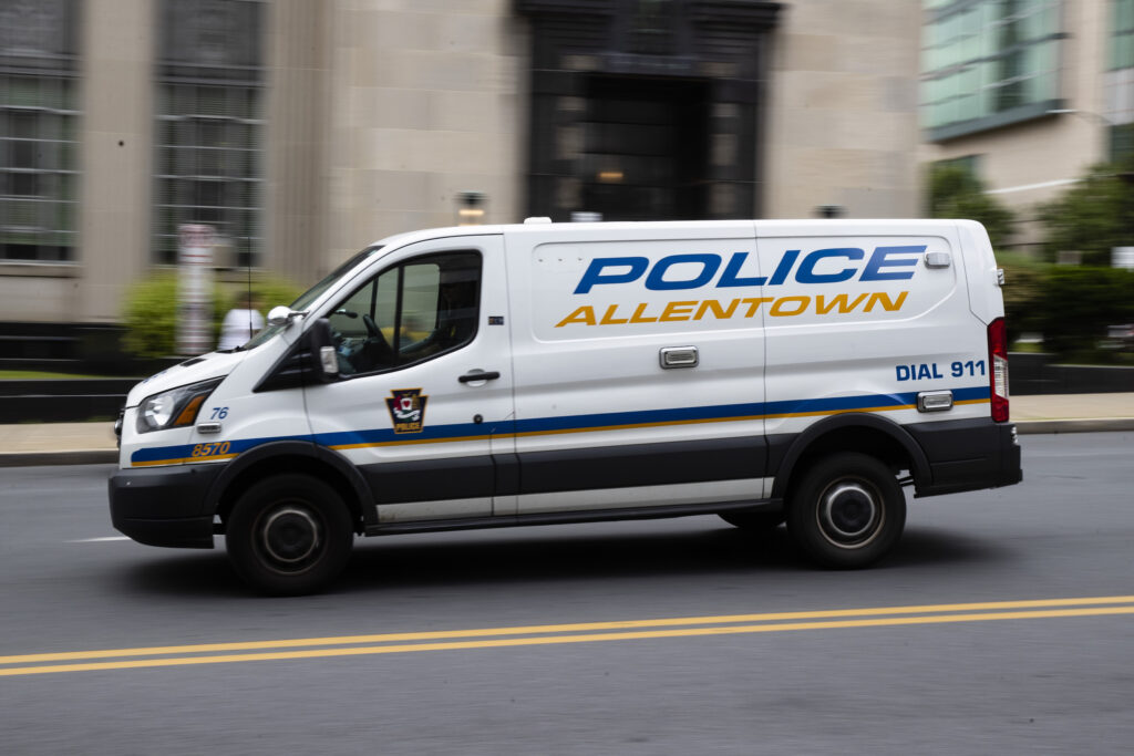 Virus Outbreak Relief Left Out A white van that says