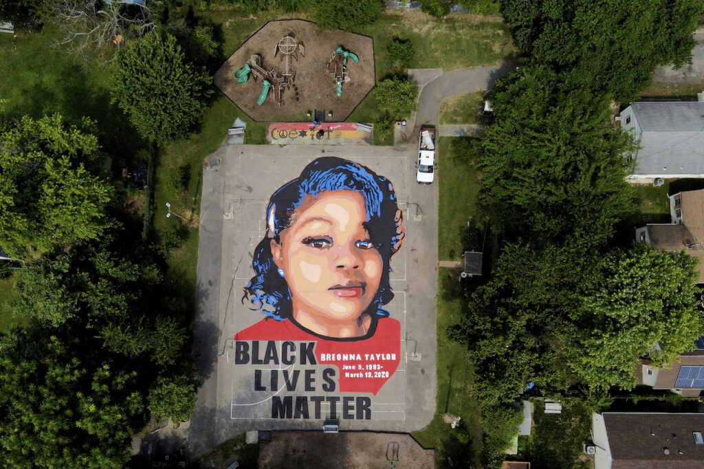 Racial Injustice Taylor Mural A ground mural depicting a portrait of Breonna Taylor is seen at Chambers Park, Monday, July 6, 2020, in Annapolis, Md. The mural honors Taylor, a 26-year old Black woman who was fatally shot by police in her Louisville, Kentucky, apartment. The artwork was a team effort by the Banneker-Douglass Museum, the Maryland Commission on African American History and Culture, and Future History Now, a youth organization that focuses on mural projects. (AP Photo/Julio Cortez)