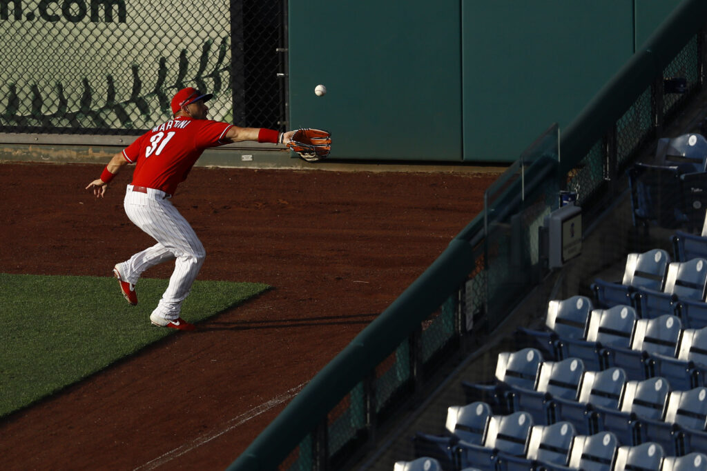 Nick Martini Philadelphia Phillies' Nick Martini catches a fly ball hit by Josh Harrison during an intrasquad baseball game Tuesday, July 14, 2020, in Philadelphia. (AP Photo/Matt Slocum)