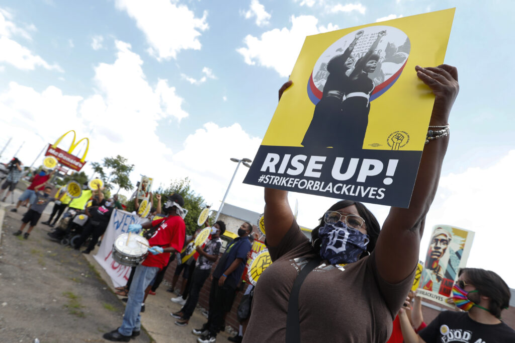 Racial Injustice Black Strike Day Michigan Protesters rally outside a McDonald's in Detroit, Monday, July 20, 2020. The national workers strike saw people walk off the job Monday in U.S. cities to protest systemic racism and economic inequality. (AP Photo/Paul Sancya)