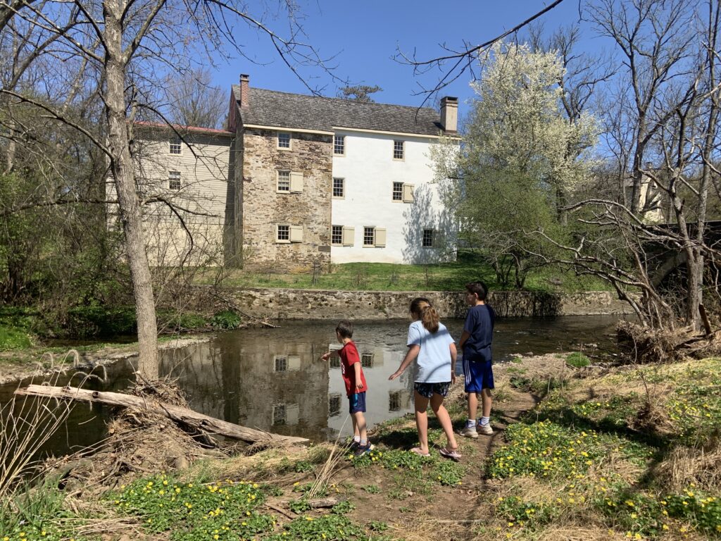 Evans Mumbower Mill Kids exploring the Wissahickon creek near the historic Evans-Mumbower Mill. (Photo by Julie Watt)