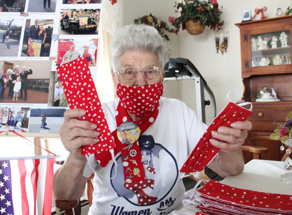 Image from iOS (127) Mae Krier is busy sewing face masks in the ‘Rosie the Riveter’ pattern at her home in Levittown, Pa. (Emma Lee/WHYY)