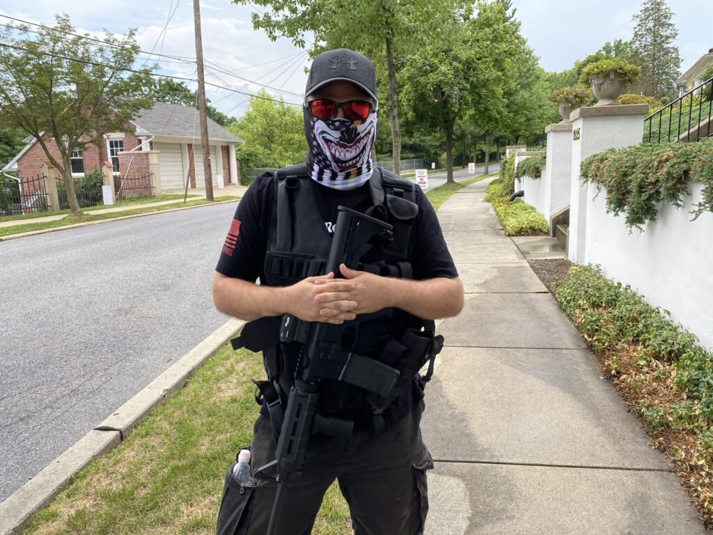 PA_post_berks_county_armed_protester_072820 A man dressed in all black wore a tactical vest and carried an AR-15-style rifle