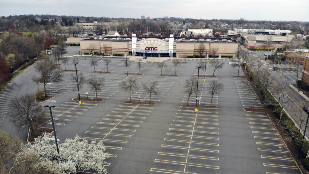 Movie chains are suing to be included in New Jersey’s reopening plans. An empty parking lot is seen at an AMC movie theater in Clifton, N.J, on April 5. AMC movie theater in Clifton, N.J.