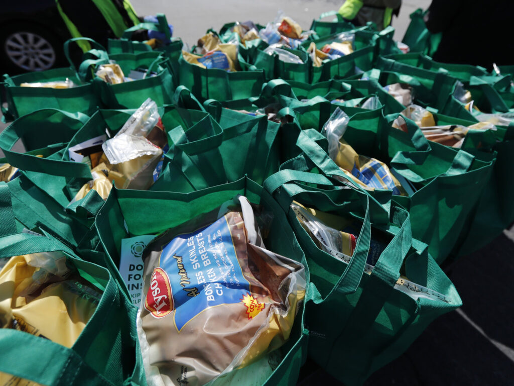 ap_20135Bags of fresh food wait to be given away in Chicago in May. The number of malnourished people is expected to climb globally, according to the United Nations.5197340641 Bags of fresh food wait to be given away in Chicago in May. The number of malnourished people is expected to climb globally, according to the United Nations.