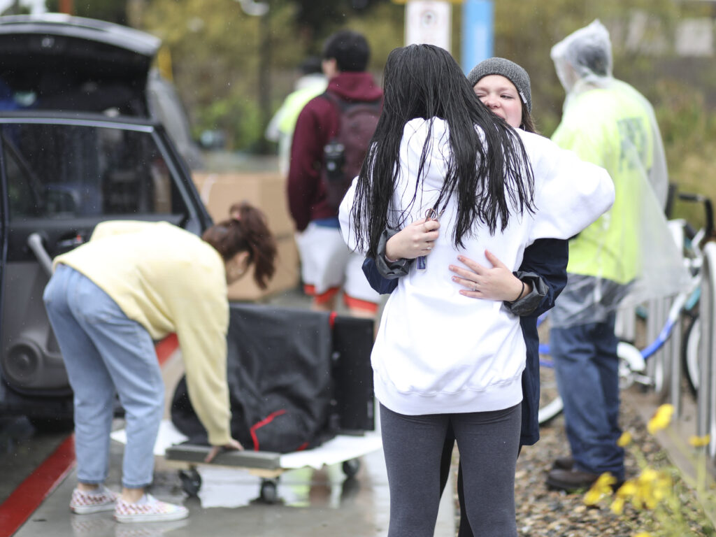 Students move out of dormitories at San Diego State University in March, after the university cancelled the rest of the semester and has asked students to move out within 48 hours. Nine percent of young adults say they've moved due to the COVID-19 pandemic. (Sandy Huffaker/AFP via Getty Images)