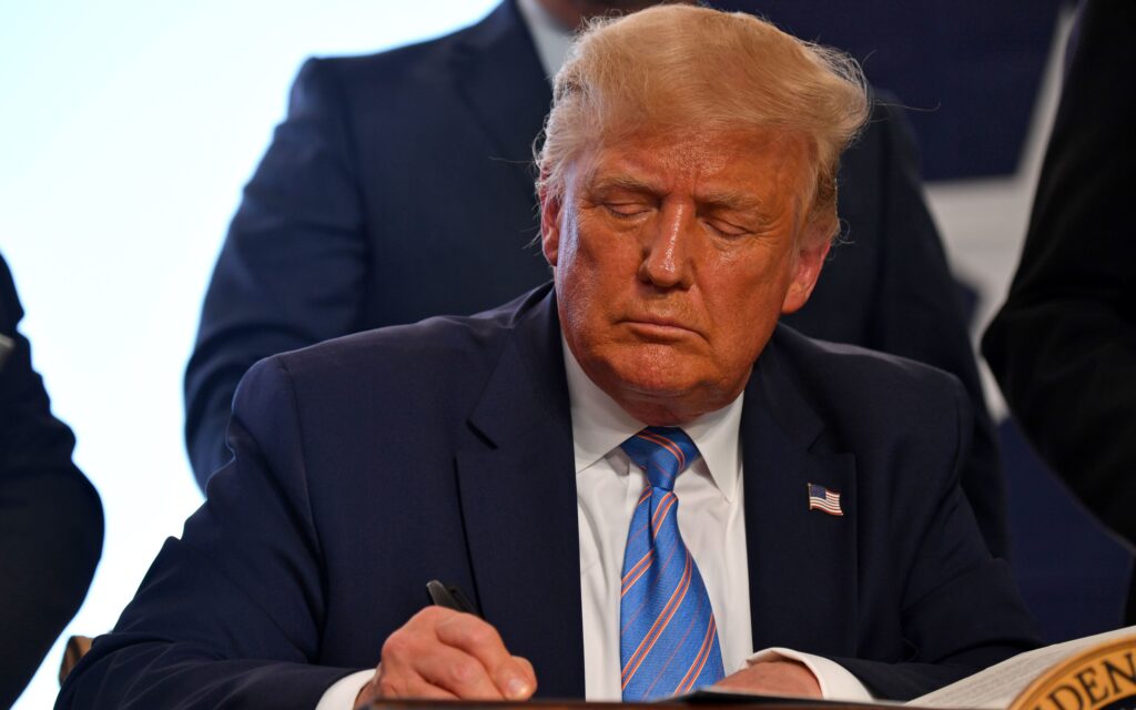 President Trump signs energy permits in Midland, Texas, on Wednesday. President Trump