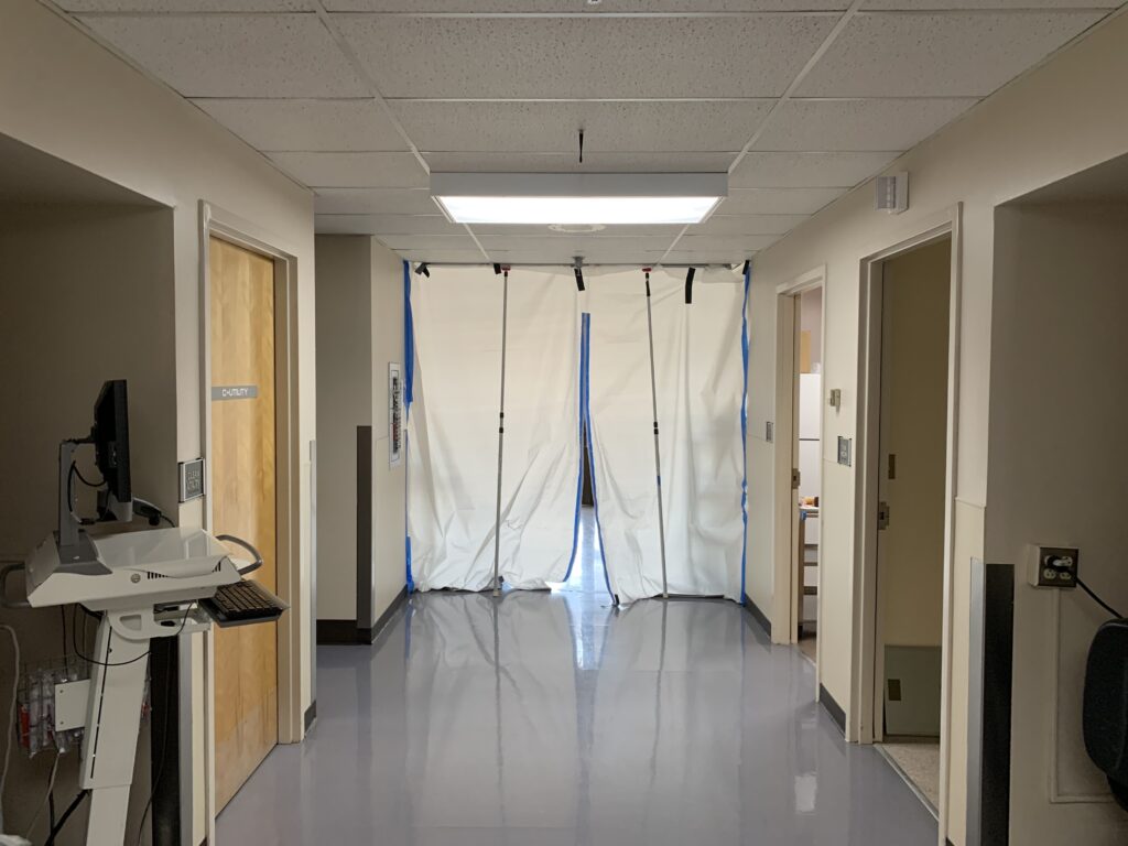 A hallway leads to a makeshift isolation ward for COVID-19 patients. A hallway leads to a makeshift isolation ward for COVID-19 patients. (Kirk Siegler/NPR)