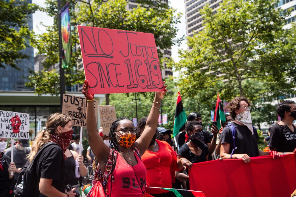 nofreedomsince1619 Protesters held a rally for reparations and racial justice on the Fourth of July outside Philadelphia’s Municipal Services building. (Kimberly Paynter/WHYY)