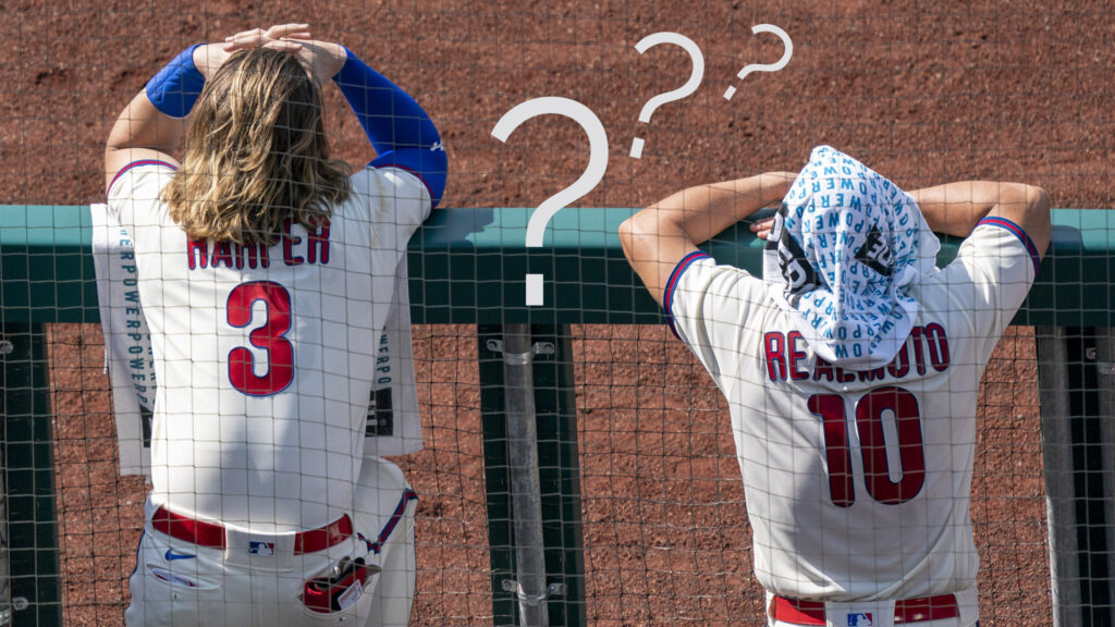 Marlins Phillies Baseball Philadelphia Phillies' Bryce Harper, left, and J.T. Realmuto, right look on from the dugout during the first inning of a baseball game against the Miami Marlins, Sunday, July 26, 2020, in Philadelphia. The Marlins won 11-6. (AP Photo/Chris Szagola)