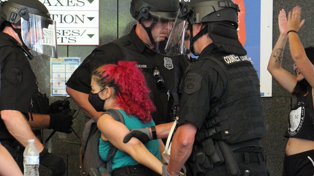 protesters-msb-arrestedpolice-crop-1024×576 Police lead a protester away during a protest inside Philly's Municipal Services Building on June 23, 2020. (Emma Lee/WHYY)