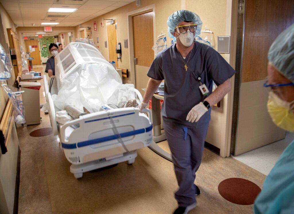 2020 03 19-jeff rhode-nj teaneck holy name medical center-covid-19 pandemic patient transport-2 A COVID-19 patient is transported at Holy Name Medical Center in Teaneck, New Jersey, on March 19, 2020. (Jeff Rhode /Holy Name Medical Center)