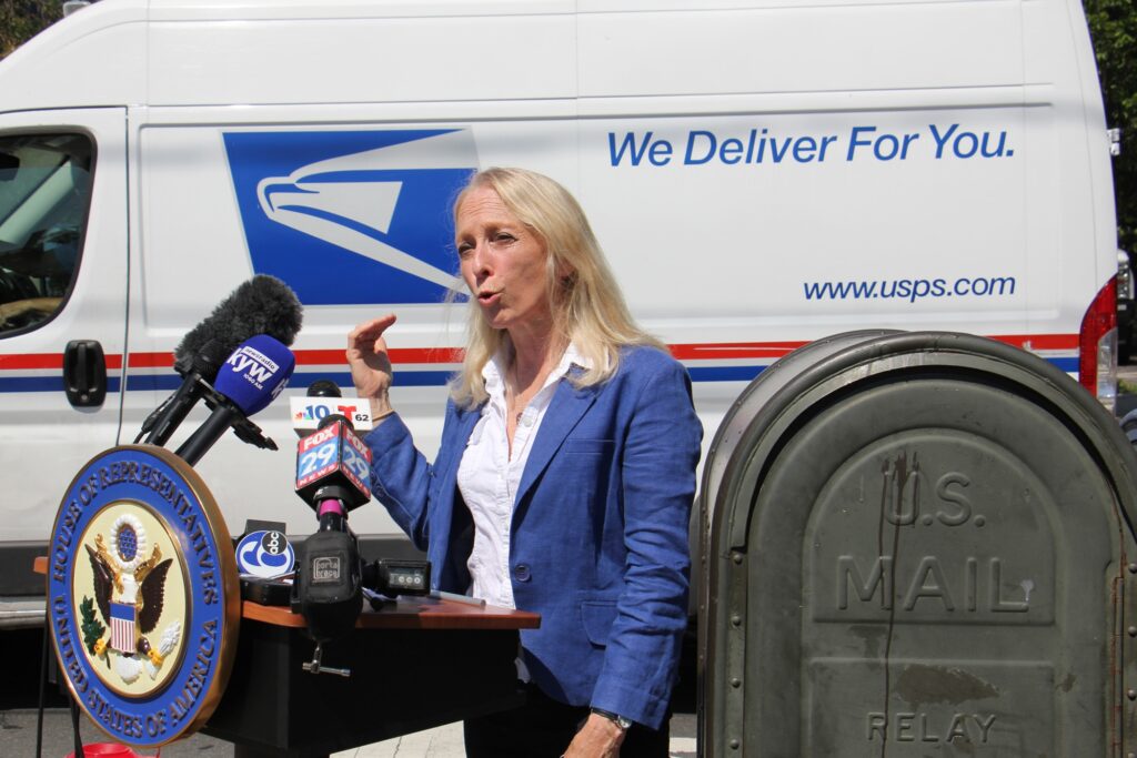 2020 08 05-e lee-mary gay scanlon-philadelphia-postal service funding bill U.S. Rep. Mary Gay Scanlon joins federal, state and local officials at Second and Spring Garden streets to call for emergency funding for the struggling U.S. Postal Service. (Emma Lee/WHYY)