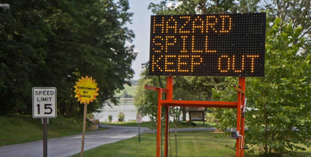 2020-8-12-k-paynter-marsh-creek-lake-10-e1597281855587-1920×972 A sign warns visitors,