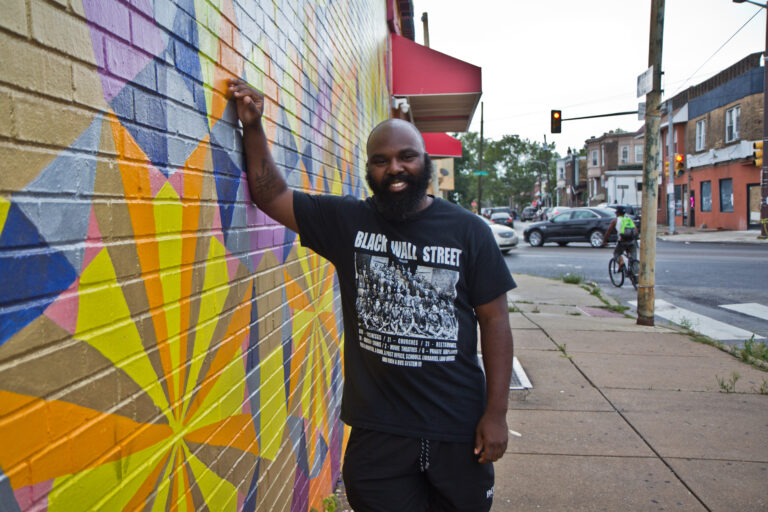 Omar Tate is a Philadelphia artist and chef. He is working to raise money to open the Honeysuckle Community Food Center in West Philadelphia. (Kimberly Paynter/WHYY)