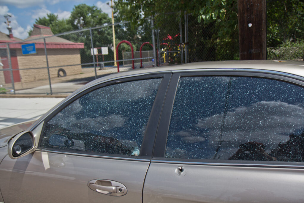2020 8 17 k paynter 38th and Poplar-3 A bullet hole in a vehicle outside Clayborn and Lewis Playground in West Philadelphia. (Kimberly Paynter/WHYY)