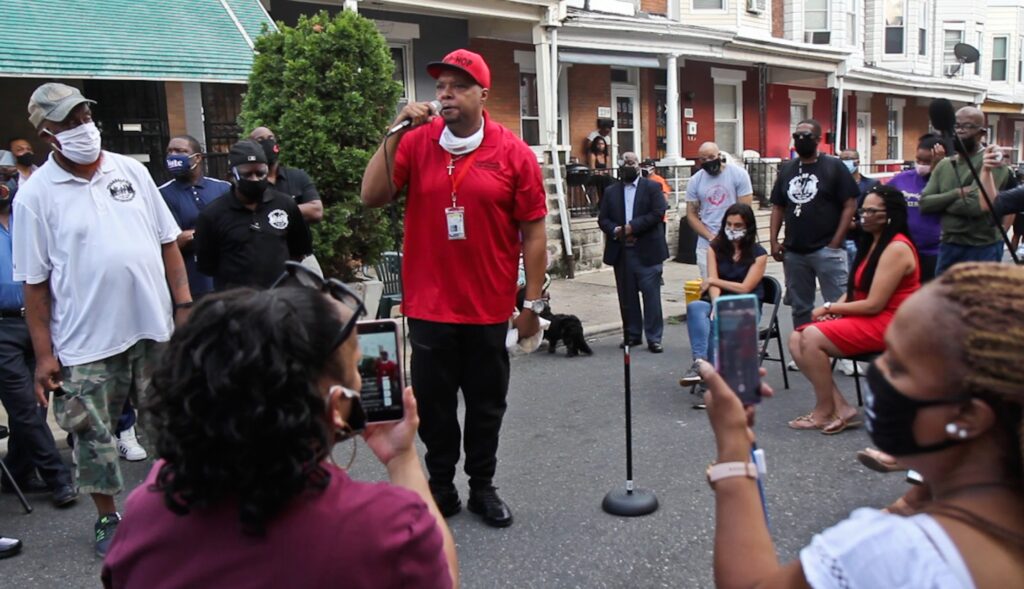 2020 8 6 k paynter simpson street community meeting-4 Colwin Williams with Cure Violence tells Simpson Street residents that officials are putting a bandaid on the problem and not dealing with real issues surrounding gun violence. An emergency meeting was called on August 6, 2020, after 7-year-old Zamar Jones was fatally shot. (Kimberly Paynter/WHYY)