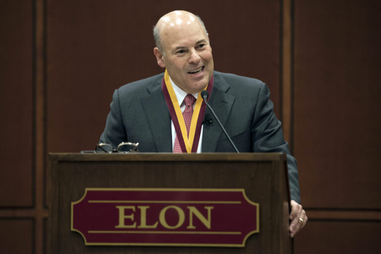 In this March 1, 2017, file photo, Elon Trustee Louis DeJoy is honored with Elon's Medal for Entrepreneurial Leadership in Elon. N.C. (Kim Walker/Elon University via AP)