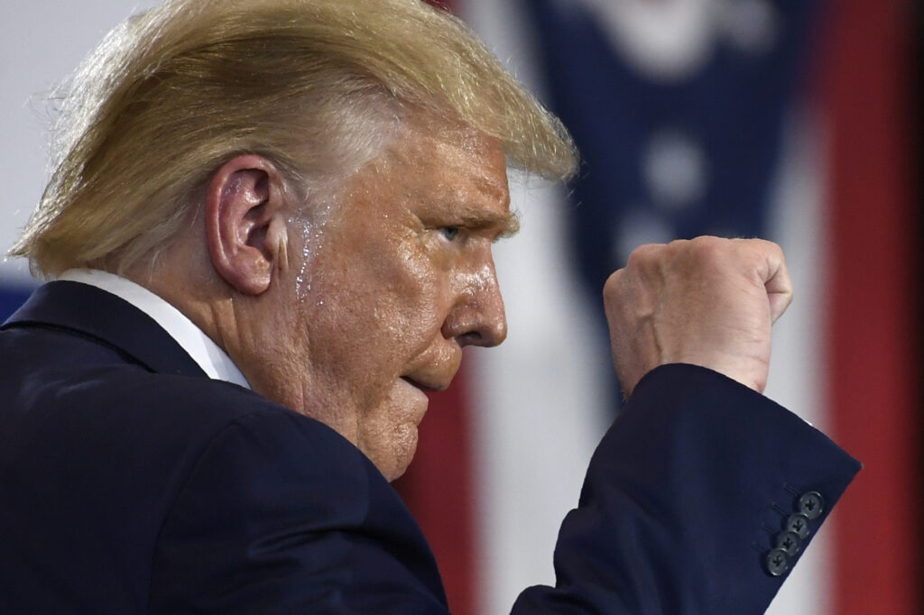 Donald Trump President Donald Trump pumps his fist as he finishes speaking during an event at the Whirlpool Corporation facility in Clyde, Ohio, Thursday, Aug. 6, 2020. (AP Photo/Susan Walsh)