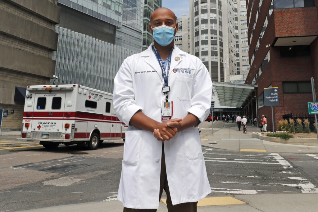 Election 2020 – Doctors Registering Voters Alister Martin, an emergency room doctor at Massachusetts General Hospital, poses outside the hospital, Friday, Aug. 7, 2020, in Boston. Martin founded the organization