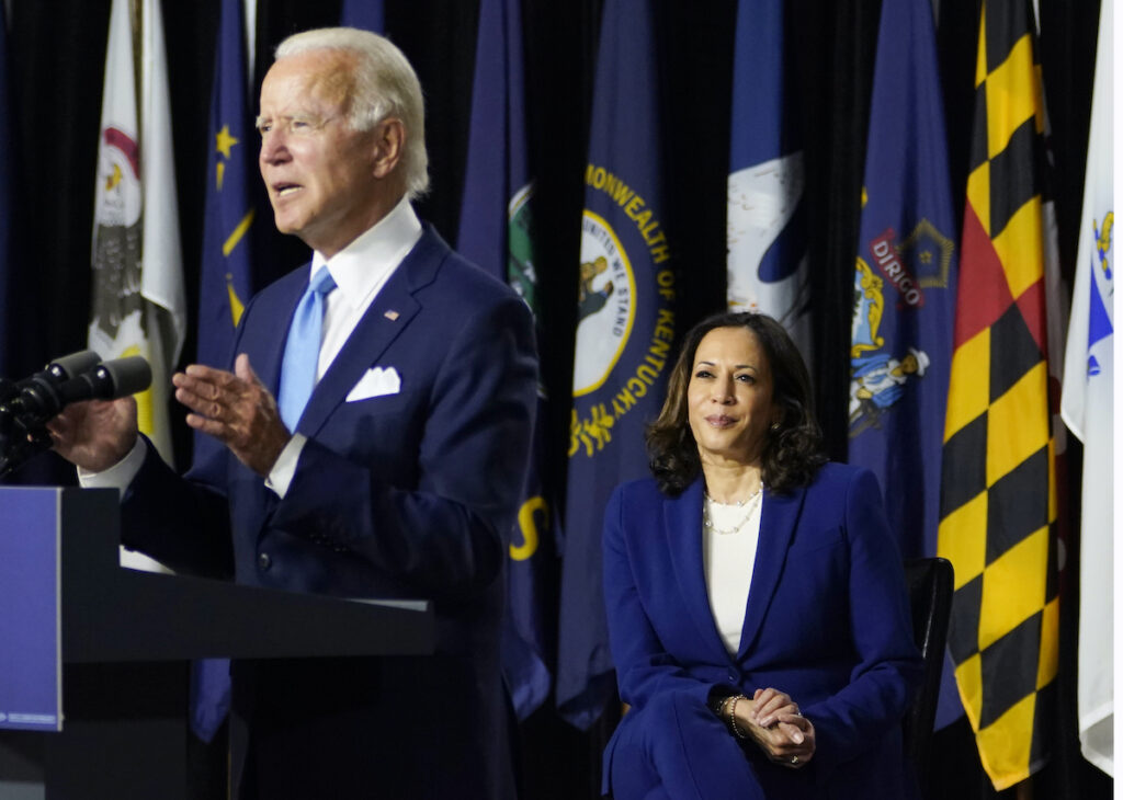 Joe Biden, Kamala Harris Democratic presidential candidate former Vice President Joe Biden, joined by his running mate Sen. Kamala Harris, D-Calif., speaks during a campaign event at Alexis Dupont High School in Wilmington, Del., Wednesday, Aug. 12, 2020. (AP Photo/Carolyn Kaster)