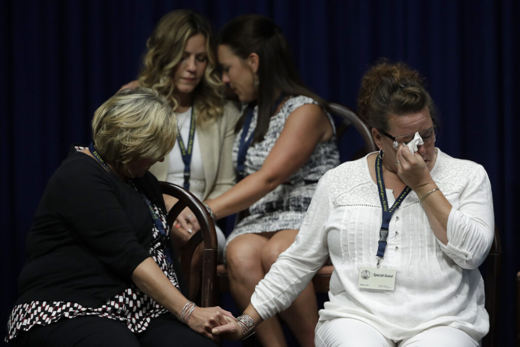 Clergy Abuse Pennsylvania FILE - In this Aug. 14, 2018, file photo, victims of clergy sexual abuse, or their family members, react as Pennsylvania Attorney General Josh Shapiro speaks during a news conference at the State Capitol in Harrisburg, Pa. Pennsylvania Roman Catholic dioceses are facing recent lawsuits from people hoping a court decision in 2019 has shown a way around time limits for filing litigation. (AP Photo/Matt Rourke, File)