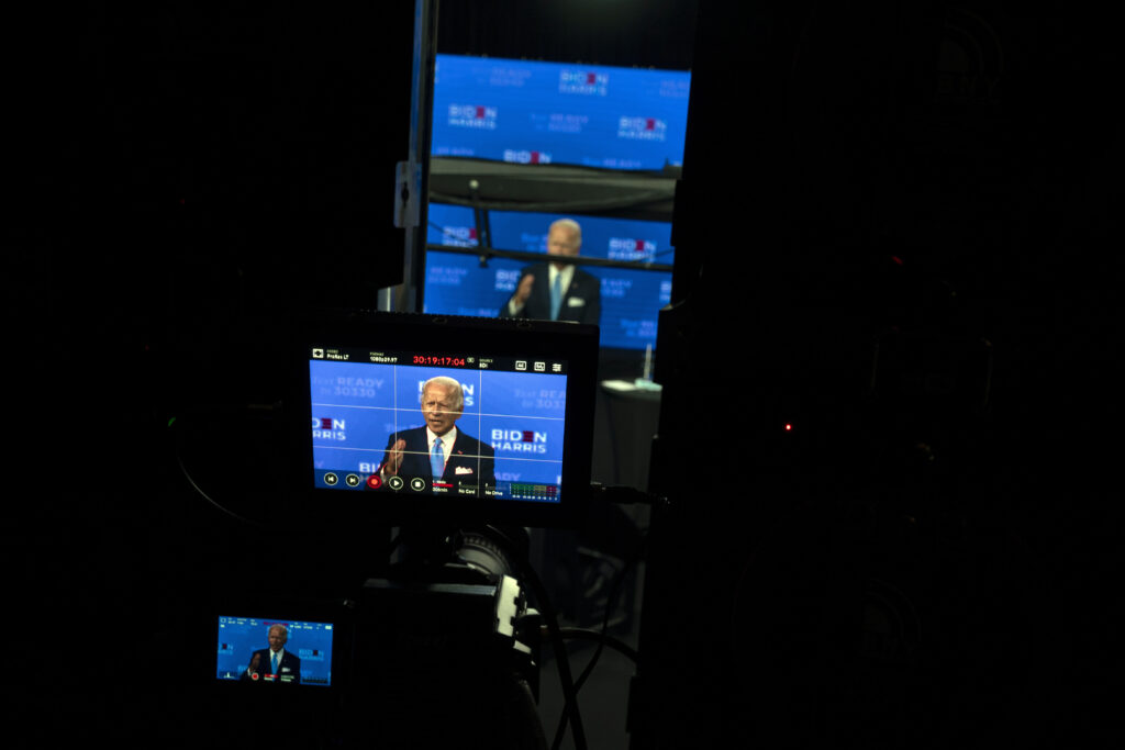 Joe Biden In this Aug. 12, 2020, file photo Democratic presidential candidate former Vice President Joe Biden is seen on monitors as he speaks during a virtual grassroots fundraiser at the Hotel DuPont in Wilmington, Del. As Democrats gather virtually this week to nominate Joe Biden for the presidency, party leaders and activists across the political spectrum agree on one unifying force: their desire to defeat President Donald Trump. (AP Photo/Carolyn Kaster, File)