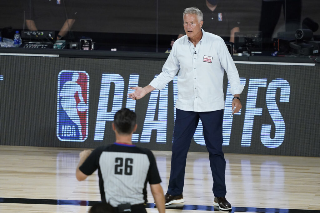 76ers Celtics Basketball Philadelphia 76ers head coach Brett Brown looks to an official during the first half of an NBA basketball first round playoff game against the Boston Celtics Monday, Aug. 17, 2020, in Lake Buena Vista, Fla. (AP Photo/Ashley Landis, Pool)