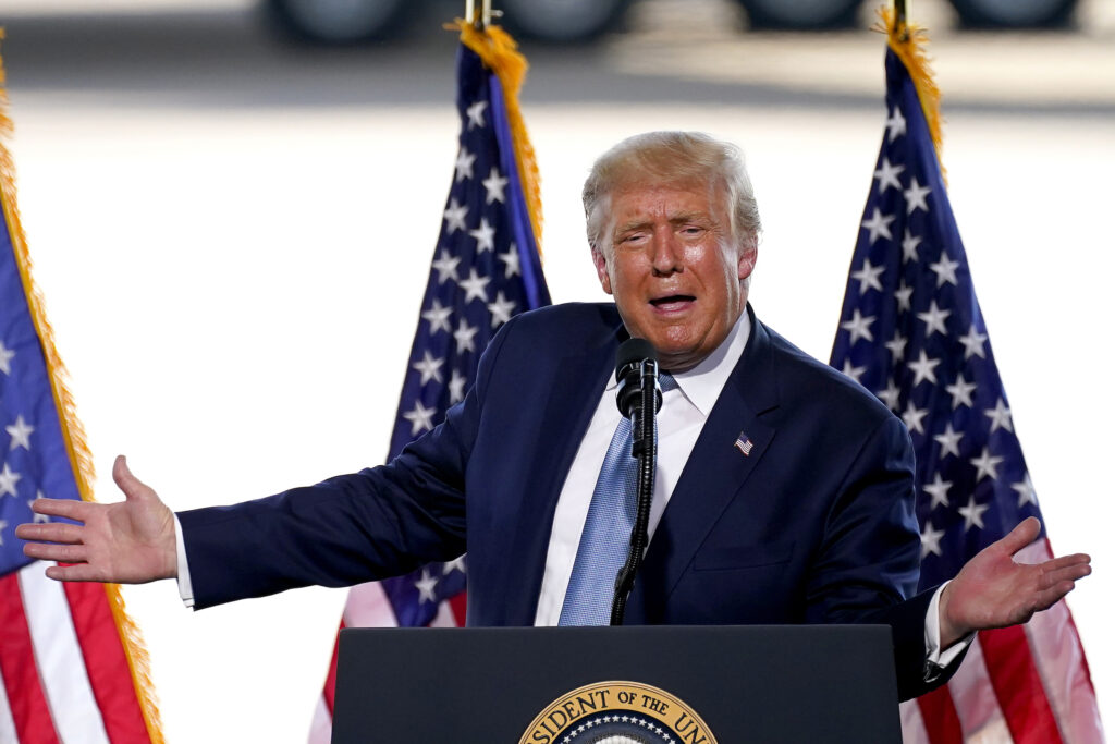 Election 2020 Trump President Donald Trump speaks to a crowd of supporters at the Yuma International Airport Tuesday, Aug. 18, 2020, in Yuma, Ariz. (AP Photo/Matt York)