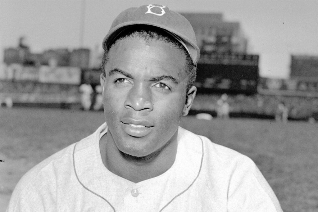 Racial Injustice MLB Baseball FILE - This is an April 18, 1948, portrait of Brooklyn Dodgers baseball player Jackie Robinson. The first statue in Dodger Stadium history belongs to Jackie Robinson. The team will unveil his likeness during Jackie Robinson Day festivities on Saturday, April 15, 2017, with his wife and extended family in attendance on the 70th anniversary of him breaking baseball's color barrier (AP Photo/File)