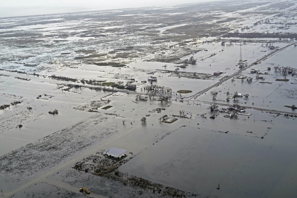 Tropical Weather State Highway 27 leading to Cameron, La. is seen in Creole, La., Friday, Aug. 28, 2020, as the storm surge recedes in the aftermath of Hurricane Laura. (AP Photo/Gerald Herbert)