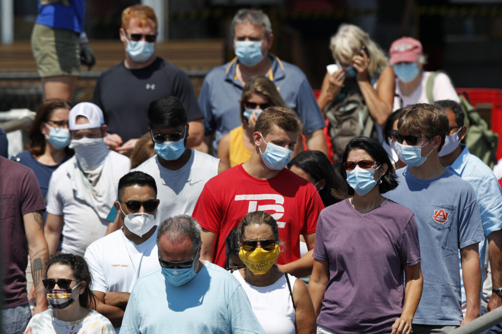 Virus Outbreak Passengers board a Casco Bay Lines ferry bound for Peaks Island