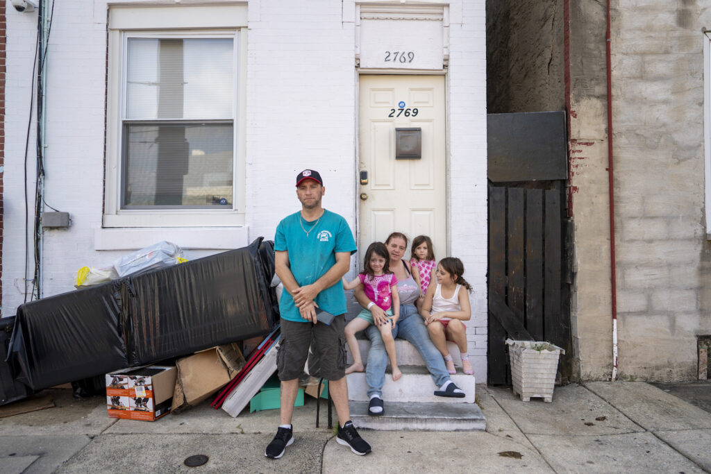 _JEK4890_1 Mike Fallaro and Lisa Swinehart lost work during the pandemic and have been threatened with eviction from their Kensington rowhouse. Two of their three children are scheduled to start school this week. (Jessica Kourkounis for Keystone Crossroads)