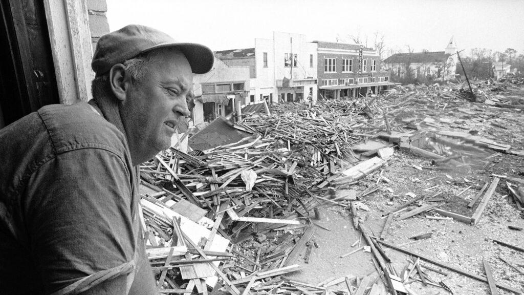 Parnell McKay, the civil defense director of Pass Christian, Miss., looks over the town’s main business district on Aug. 23, 1969 after Hurricane Camille passed through. Parnell McKay, the civil defense director of Pass Christian, Miss., looks over the town's main business district on Aug. 23, 1969 after Hurricane Camille passed through. (Jack Thornell/AP Photo)