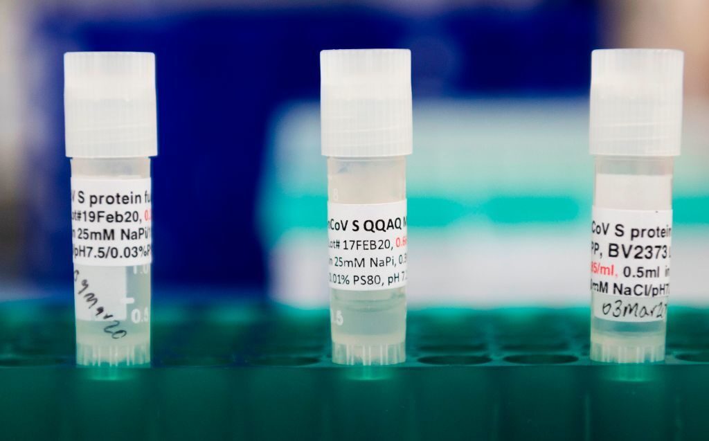 Potential COVID-19 vaccines are kept in a tray at Novavax labs in Maryland on March 20. The Novavax vaccine requires an immune-boosting ingredient called an adjuvant to be effective. Potential COVID-19 vaccines are kept in a tray at Novavax labs in Maryland on March 20. The Novavax vaccine requires an immune-boosting ingredient called an adjuvant to be effective. (Andrew Caballero-Reynolds/AFP via Getty Images)