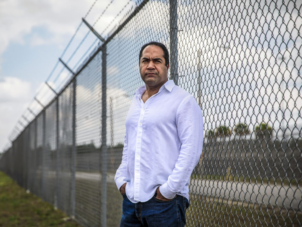 Kareen Troy Troitino, a guard at the Federal Correctional Institution, stands outside the Miami facility in April. Kareen Troy Troitino, a guard at the Federal Correctional Institution, stands outside the Miami facility in April. (Scott McIntyre for The Washington Post via Getty Images)