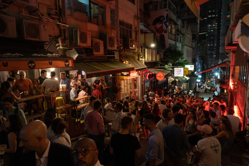 After shuttering bar districts early in the pandemic, Hong Kong reopened them in May. Some have been linked to new clusters of cases. After shuttering bar districts early in the pandemic, Hong Kong reopened them in May. Some have been linked to new clusters of cases. (Roy Liu/Bloomberg via Getty Images)
