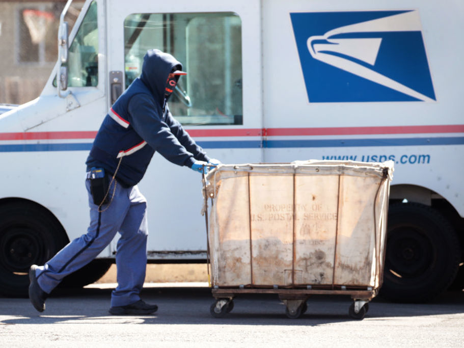 Postal service delays mean some patients don’t get much needed medications on time. Postal workers prepare mail for delivery
