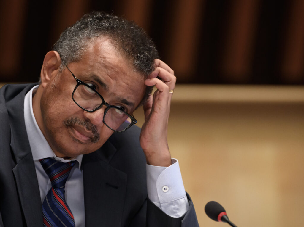 World Health Organization Director-General Tedros Adhanom Ghebreyesus at a news conference last month in Geneva. He is urging countries to join a pact aimed at ensuring access to drugs to prevent COVID-19. World Health Organization Director-General Tedros Adhanom Ghebreyesus at a news conference last month in Geneva. He is urging countries to join a pact aimed at ensuring access to drugs to prevent COVID-19. (Fabrice Coffrini/Pool/AFP via Getty Images)