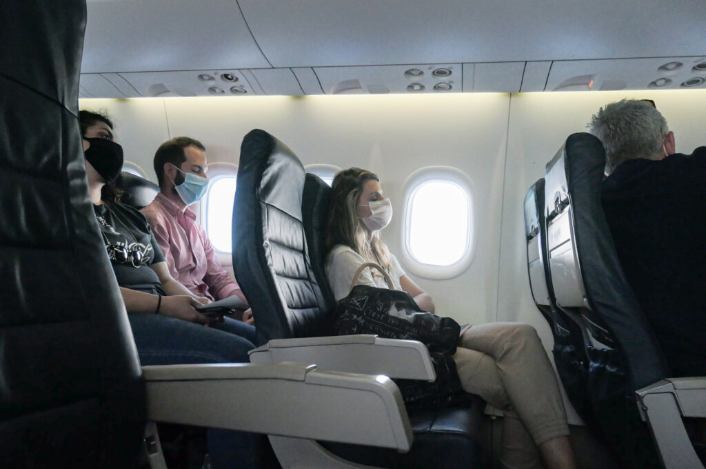 Many airlines now require passengers to wear masks to reduce the risk of COVID-19 spread — and are putting scofflaws on a no-fly list. Many airlines now require passengers to wear masks to reduce the risk of COVID-19 spread — and are putting scofflaws on a no-fly list. (Nicolas Economou/ NurPhoto via Getty Images)