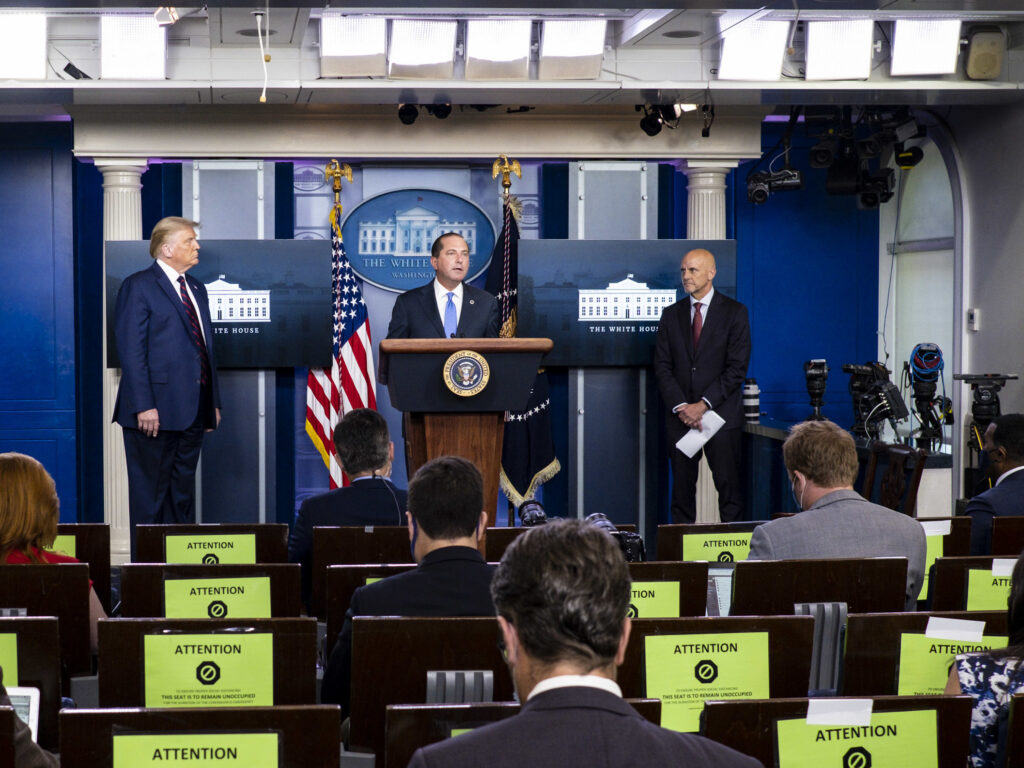 President Donald Trump, left, FDA Commissioner Stephen Hahn, right, and Health and Human Services Secretary Alex Azar, center, announced at a news conference on Sunday that the FDA issued emergency use authorization for convalescent plasma as a COVID-19 treatment. President Donald Trump