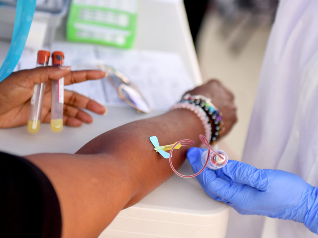 A medical worker draws blood at a free COVID-19 SARS-CoV-2 serology antibody testing community event in Los Angeles on Wednesday. A medical worker draws blood at a free COVID-19 SARS-CoV-2 serology antibody testing community event in Los Angeles on Wednesday. (Matt Winkelmeyer/Getty Images)