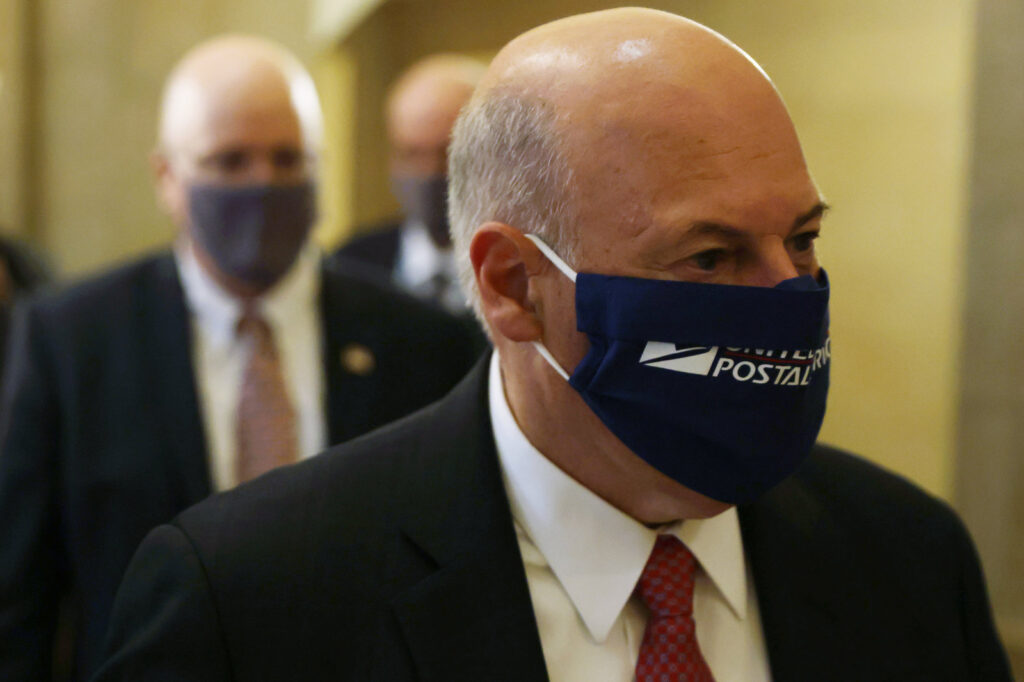 Negotiations For New Coronavirus Relief Package Continue At The Capitol Postmaster General Louis DeJoy is under fire for management changes he has made to the Postal Service that some say could slow the delivery of absentee ballots this fall. (Alex Wong/Getty Images)