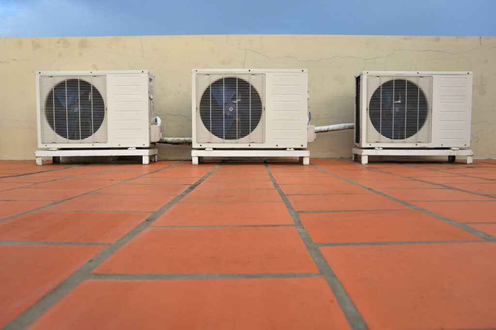 Air-conditioner on building roof floor Air conditioners on a building