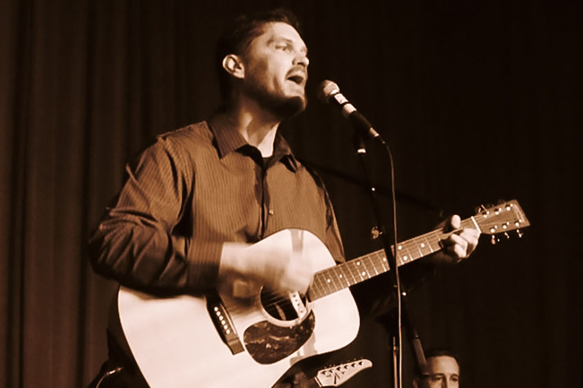johnshaun Musician John Shaughnessy singing and playing guitar